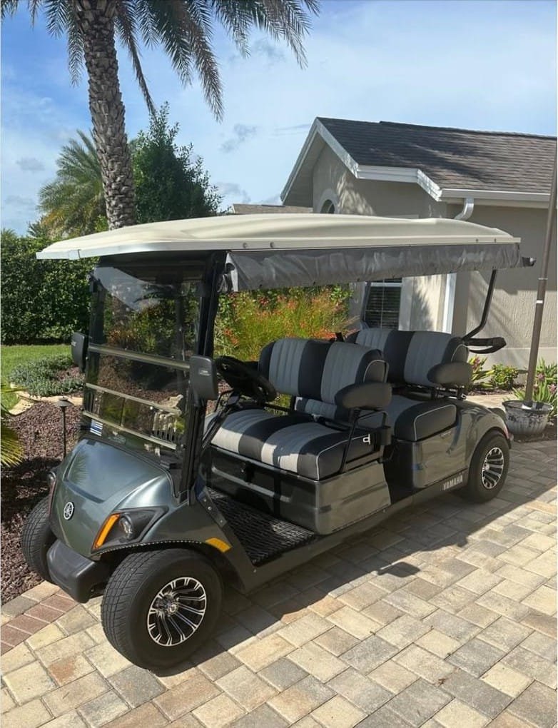 Gray Yamaha golf cart with comfortable forward-facing seats in The Villages